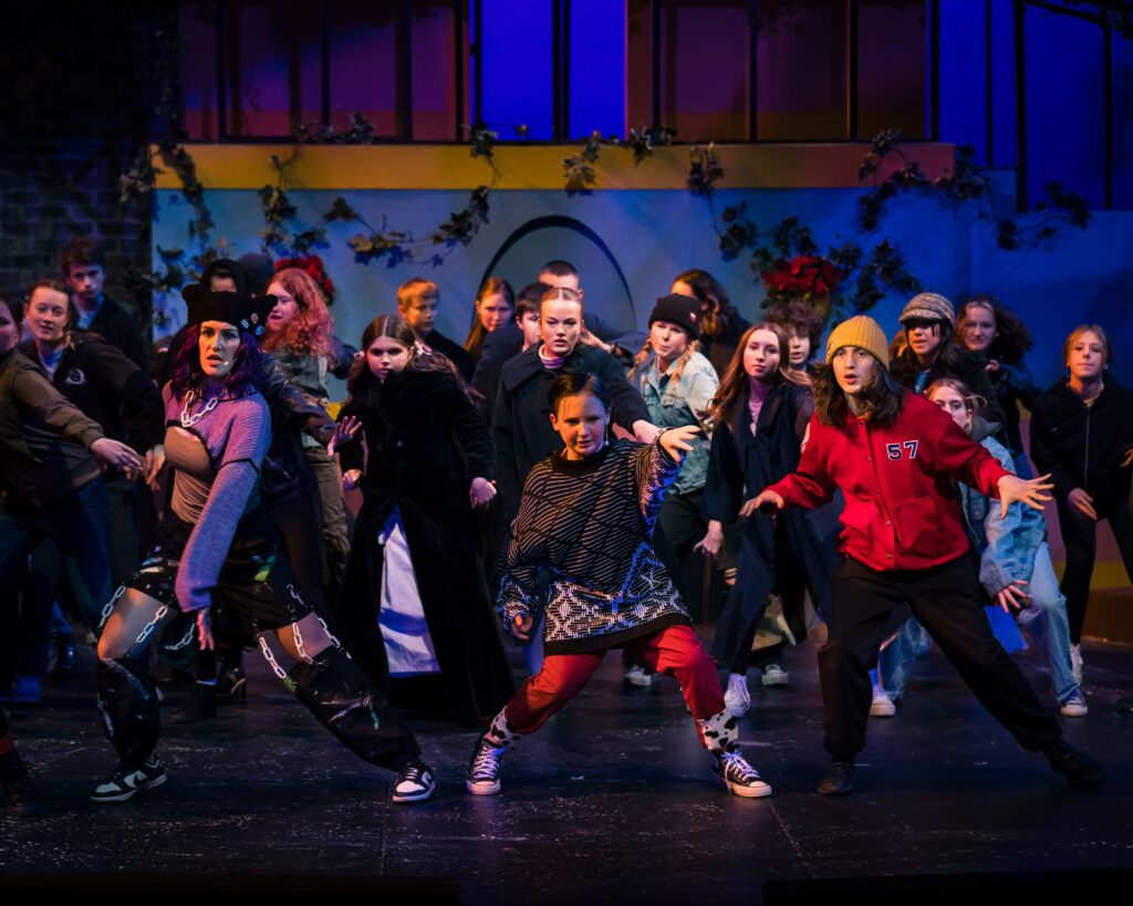 Group of young performers performing Descendents.